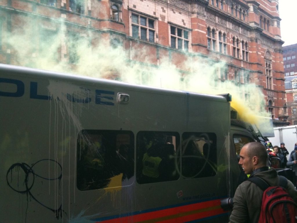 Police van is targeted by anarchists in central London