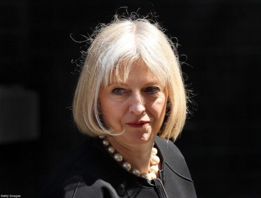 May:'The way we police in Britain is not through use of water cannon'
