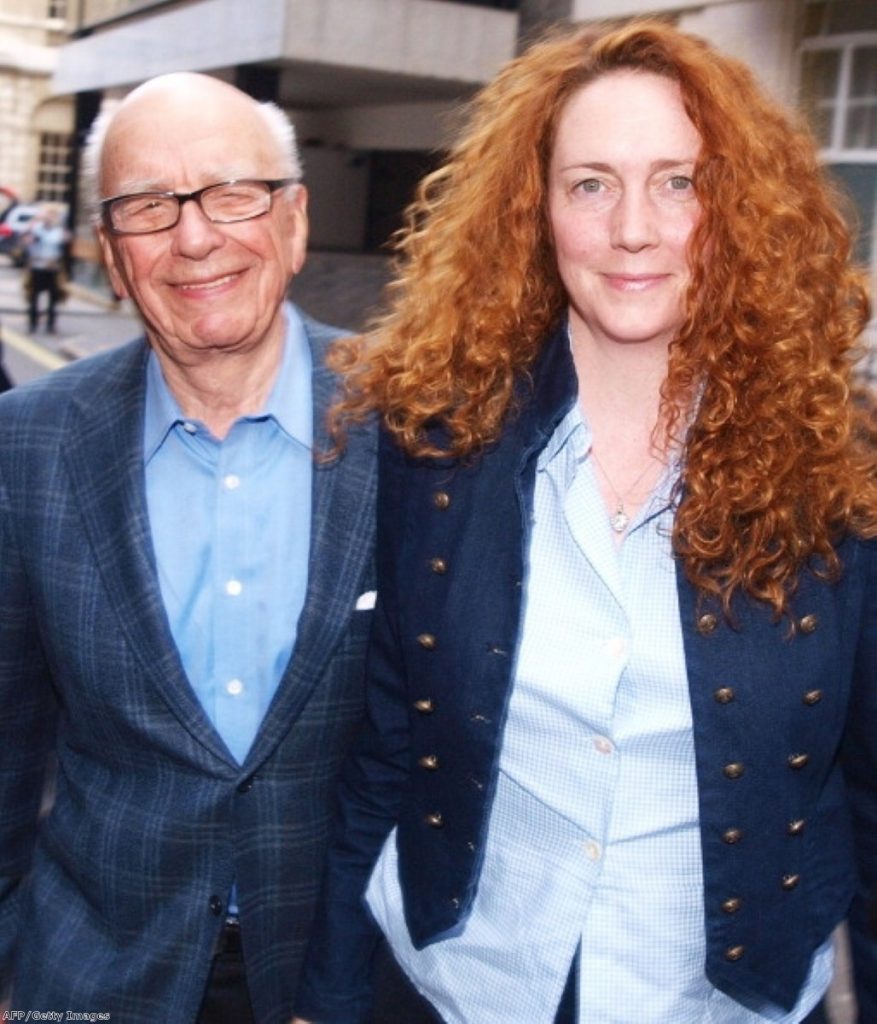 Rupert Murdoch with Rebekah Brooks, after he flew to the UK to take control of the crisis. Photo: Getty