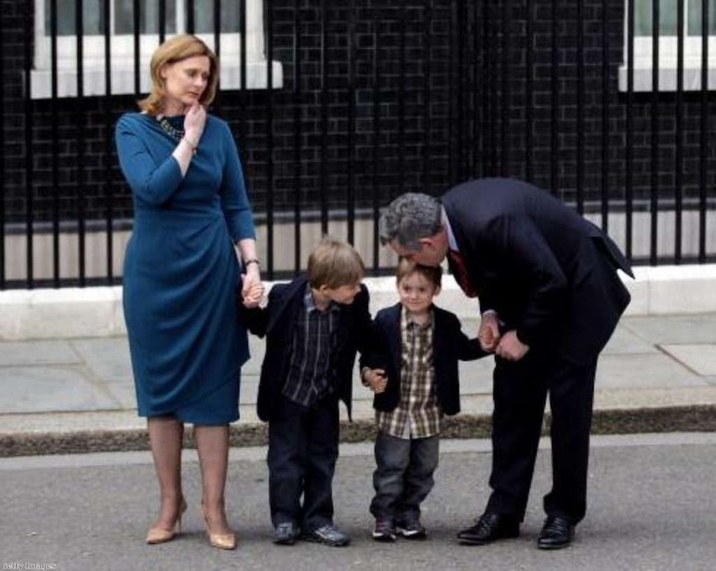 Gordon Brown leaves Downing Street with his wife Sarah and children John and Fraser