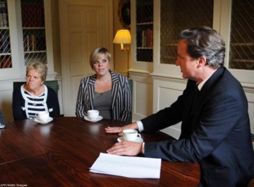 Happier days? The Dowlers meet Cameron during the phone-hacking row