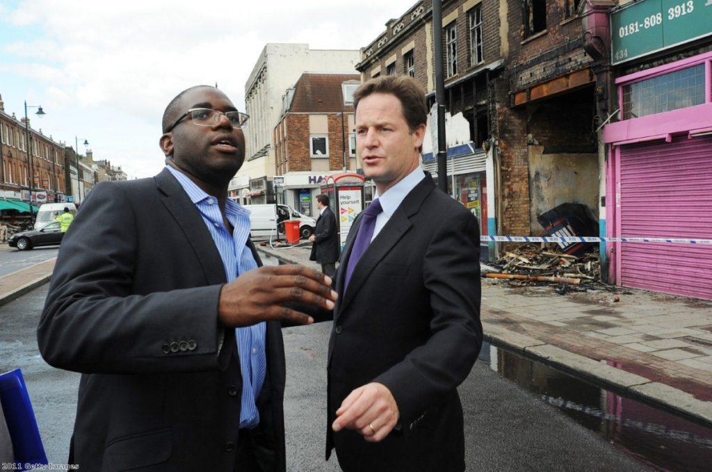 Nick Clegg talks with David Lammy as he surveys the wreckage in Tottenham.