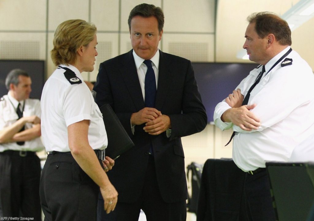 Cameron visits the west Midlands police events control room earlier this week.