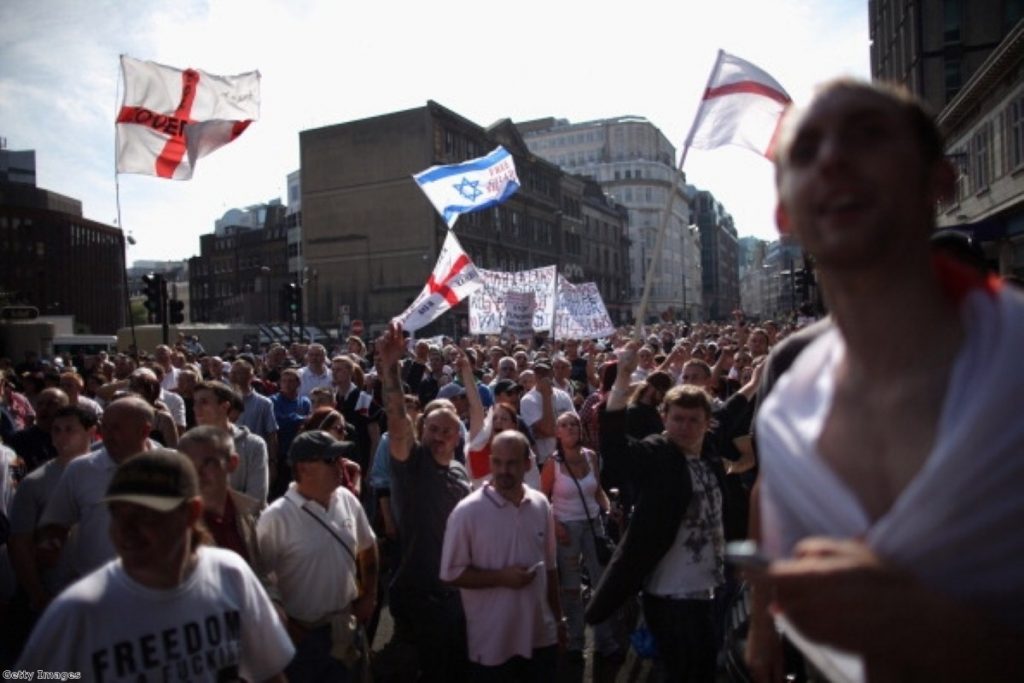 EDL members demonstrate in Tower Hamlets. the group has raised its profile since the Woolwich killing.