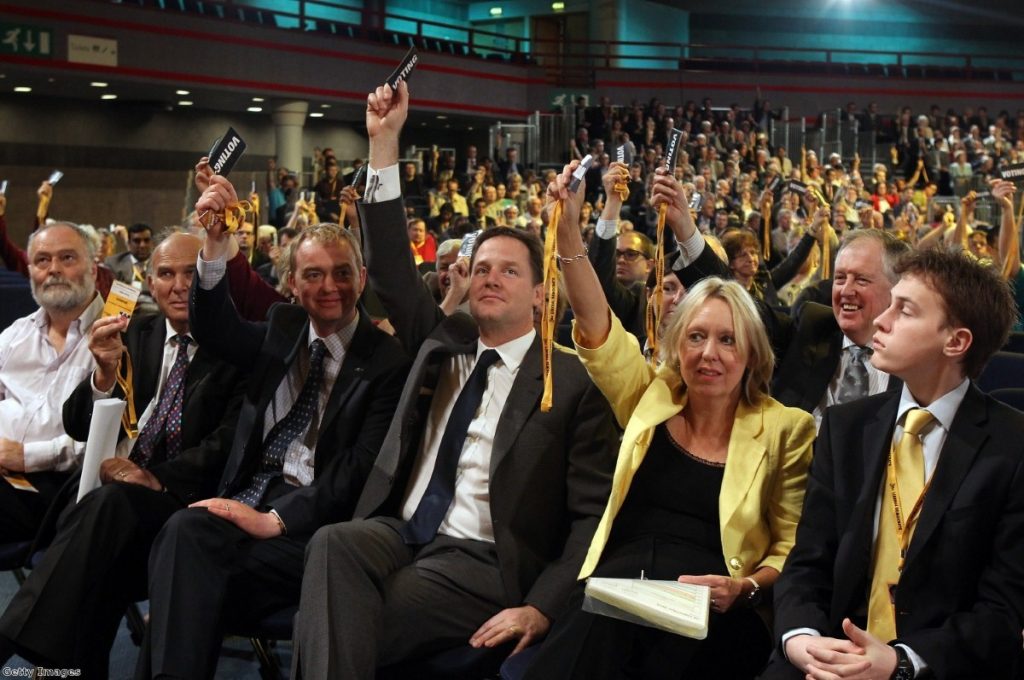 Clegg votes at the Lib Dem party conference