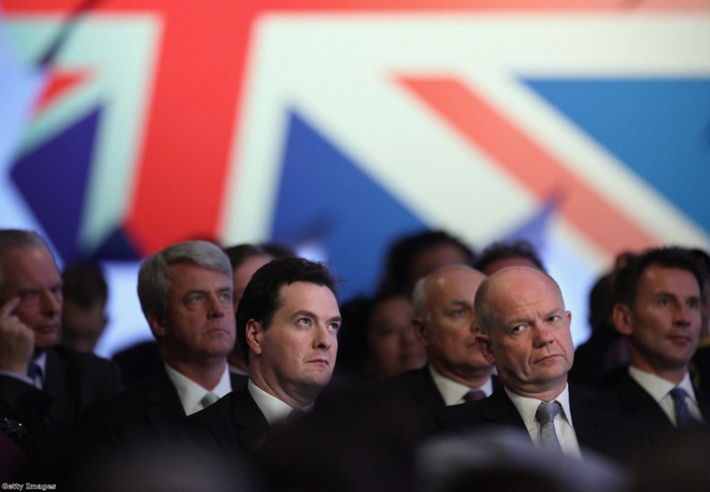 Cabinet secretaries watch Cameron's speech, which spent some time mocking them.