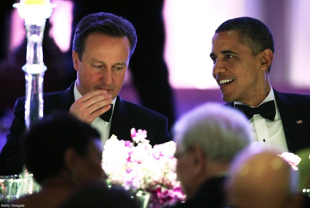 Cameron and Obama share a joke during last night's state dinner.
