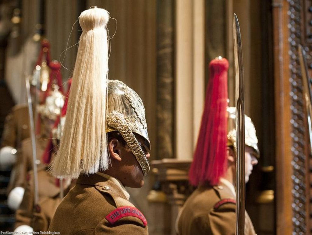 Household Cavalry stand guard in parliament for the Queen's Speech