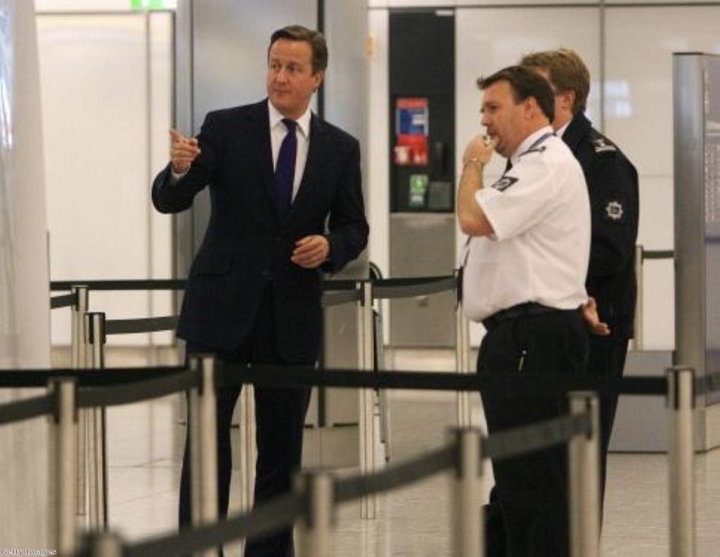 David Cameron visits border controls last November