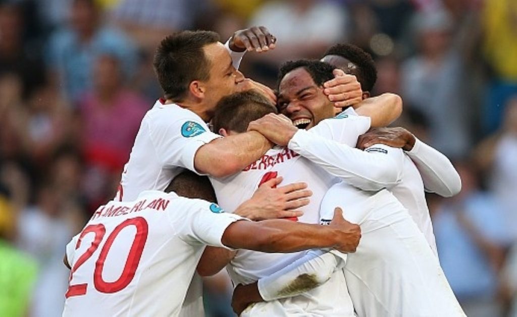England celebrate after their first goal
