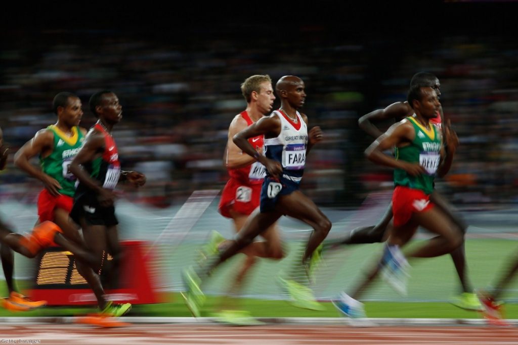 Mo Farah overtakes opponents during a spectacular 10,000 metre race yesterday.