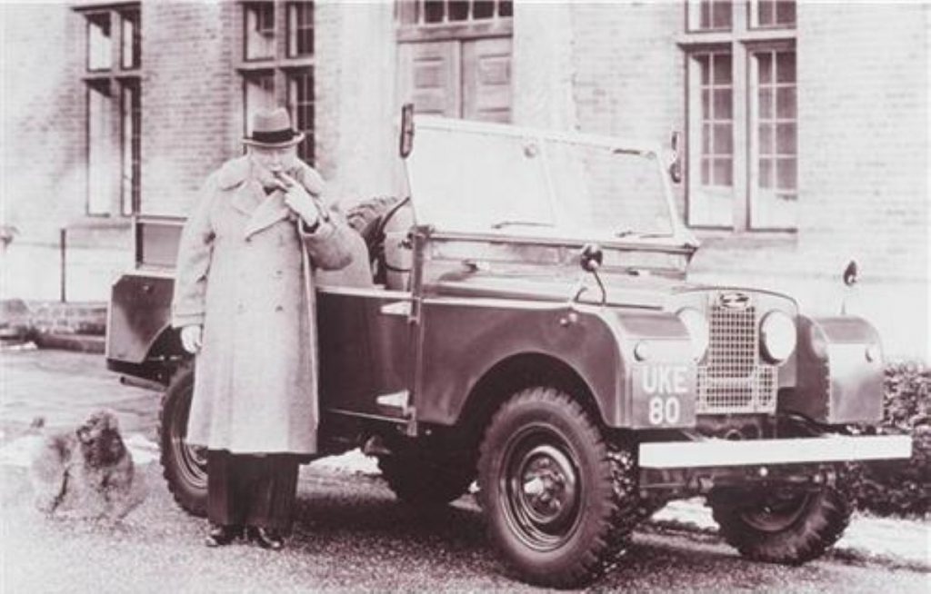 Churchill by his vintage Land Rover