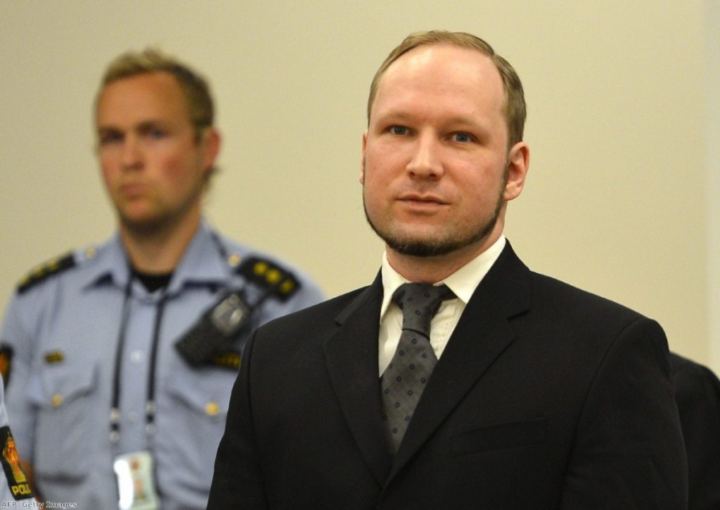Self confessed mass murderer Anders Behring Breivik arrives in court this morning