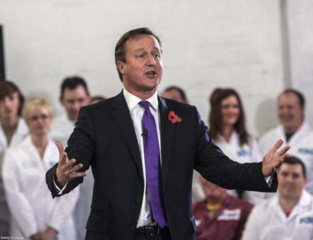 David Cameron with those nice persons in white coats