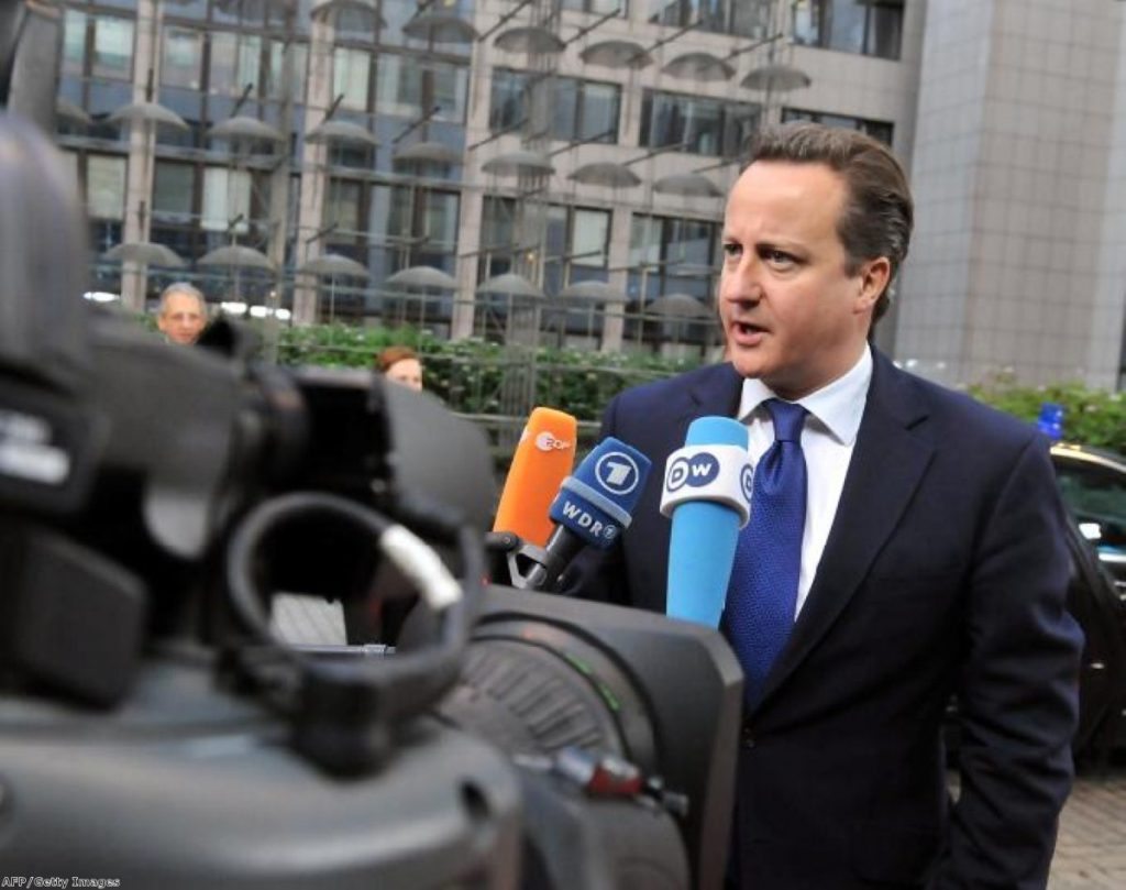 David Cameron answers questions from the press in Brussels
