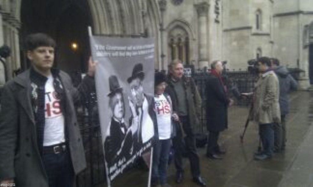 Protesters gathered outside the Royal Court of Justice