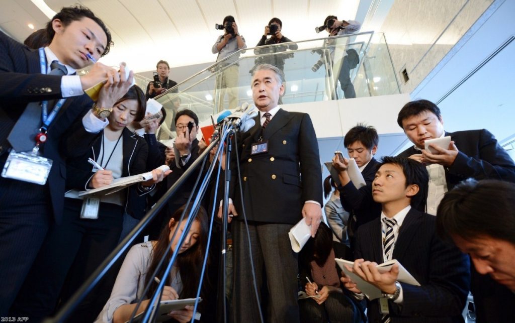 Amid a global crisis situation, Takeshi Endo, public relations manager of Japanese plant construction company JGC, answers questions in suburban Tokyo. The firm confirmed the safety of three of its Japanese staff and one Philippine employee in Algeria but the whereabouts of 74 other staff of various nationalities are unknown.