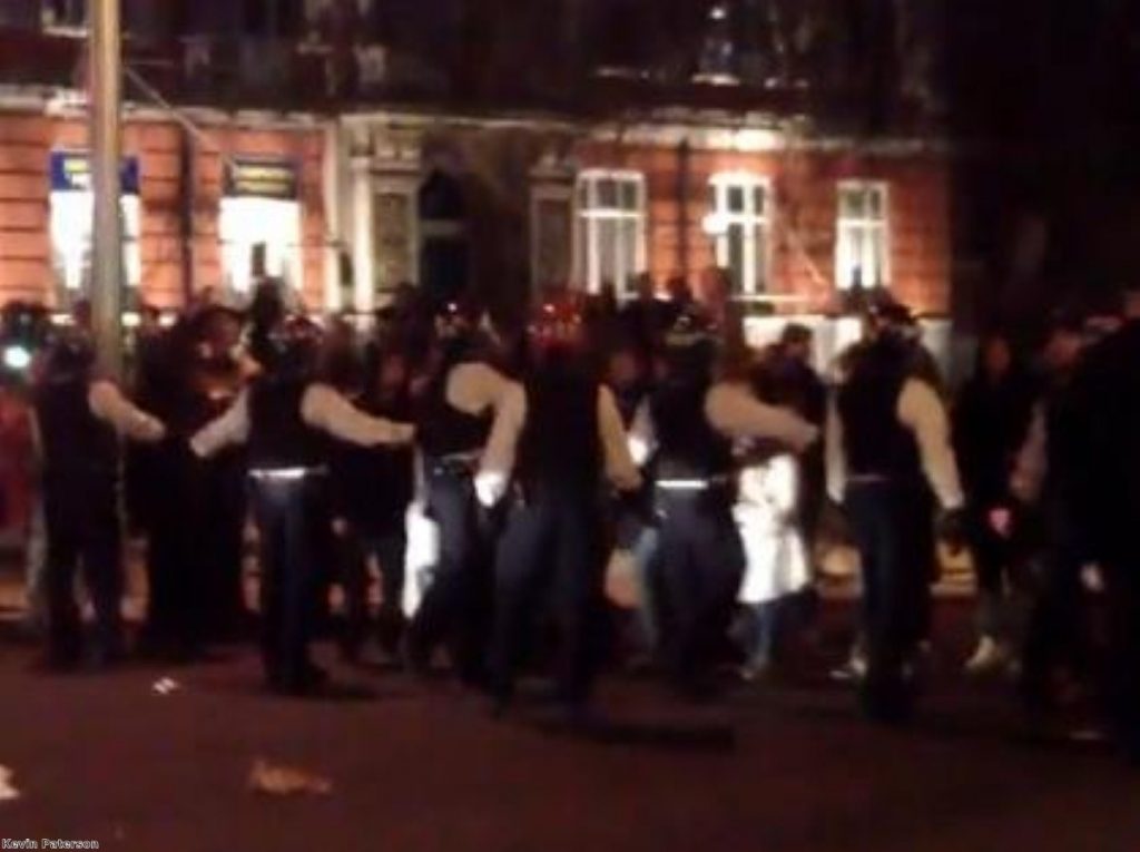 Video footage shot at the scene shows police in a standoff with those celebrating Thatcher's death
