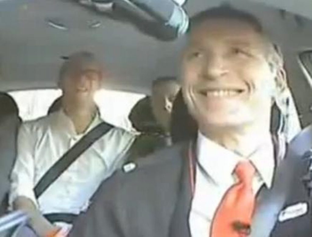 Jens Stoltenberg, Norway's prime minister, gets behind the wheel to talk to voters