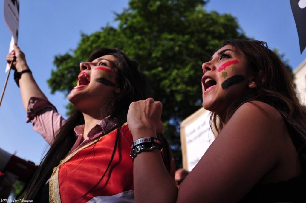 Women take part in a protest against intervention in Syria. The threat of western involvement faded after a Commons vote.