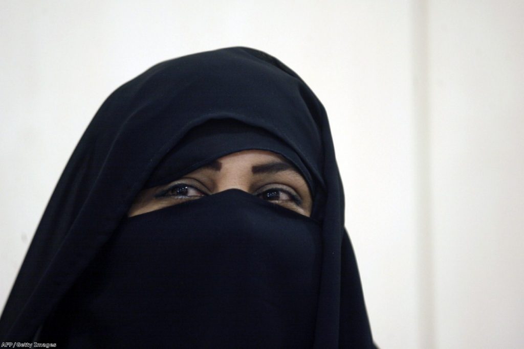 A candidate stands for election in Kuwait wearing the niqab. in Europe, the full-face veil has been a constant source of controversy.