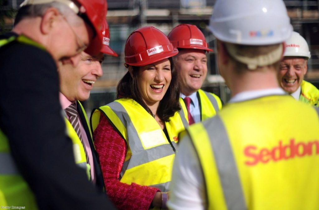 Rachel Reeves enjoys a joke with Ed Balls on a visit to a construction site. The shadow work and pensions secretary is making her first major speech in the post today.
