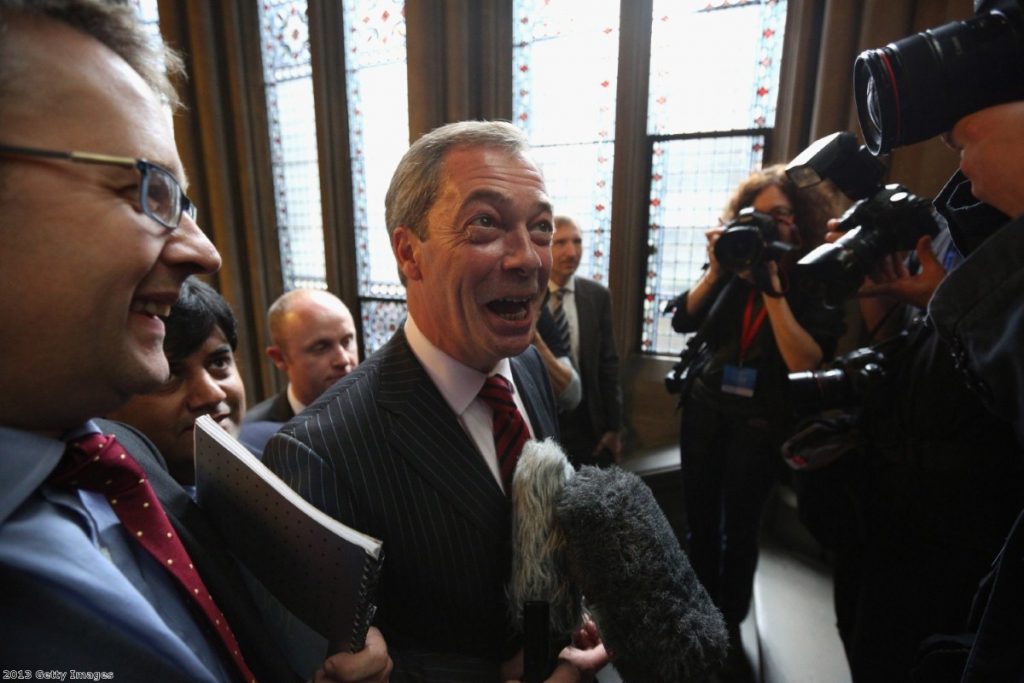 Nigel Farage greeted as he arrives at the Conservative party conference