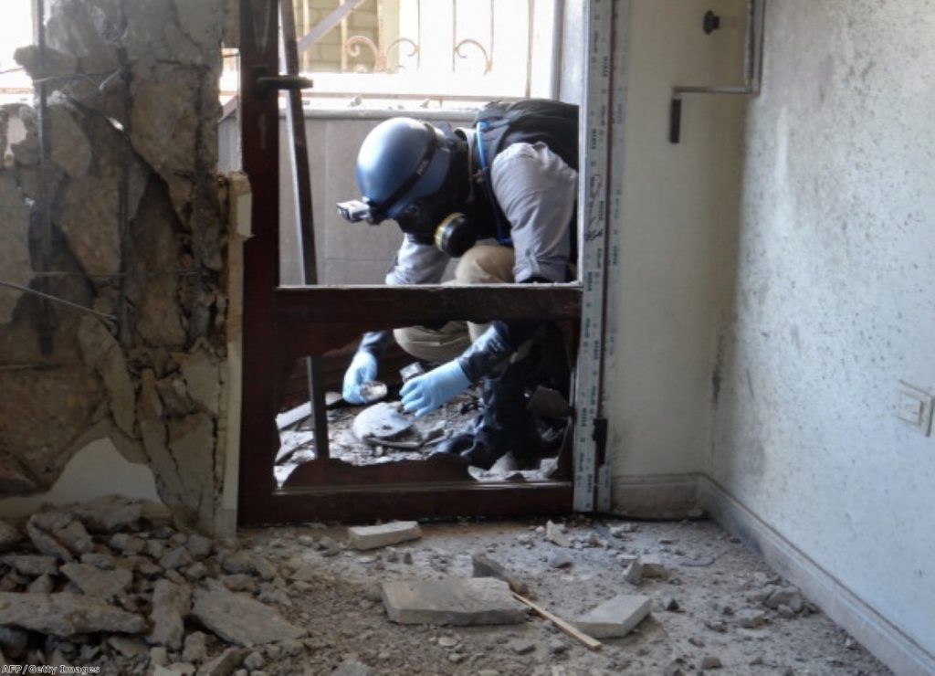 UN inspector tests the site of a suspected Syrian chemical attack.