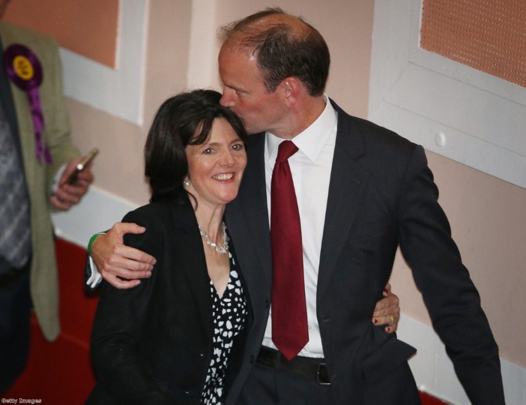 Carswell kisses his wife during a dramatic night in British politics which saw him win Clacton for Ukip