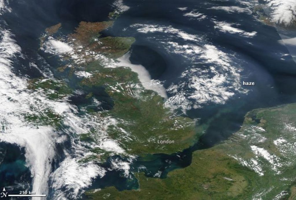 Haze covers the United Kingdom, as viewed from Nasa's Aqua satellite