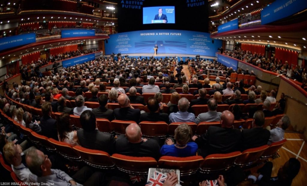 Conservative party members listen to David Cameron in Birmingham, October 2014