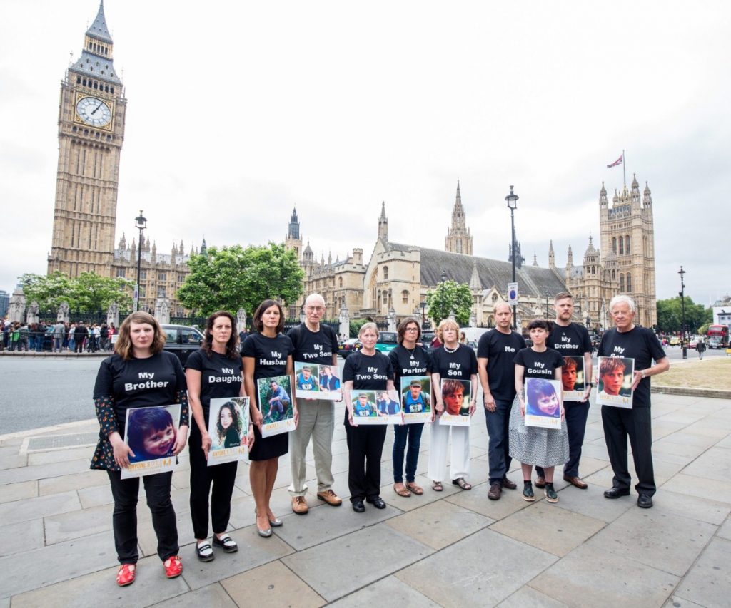 Families broken by Britain's drug laws outside parliament demanding reform