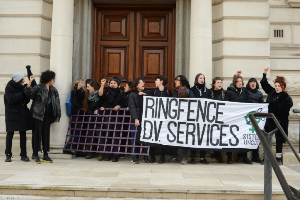 Sisters Uncut protest outside the Treasury ahead of the budget this week