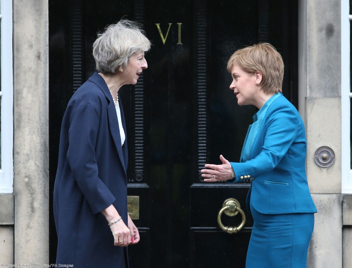Theresa May is greeted by Scotland's first minister Nicola Sturgeon at Bute House in Edinburgh