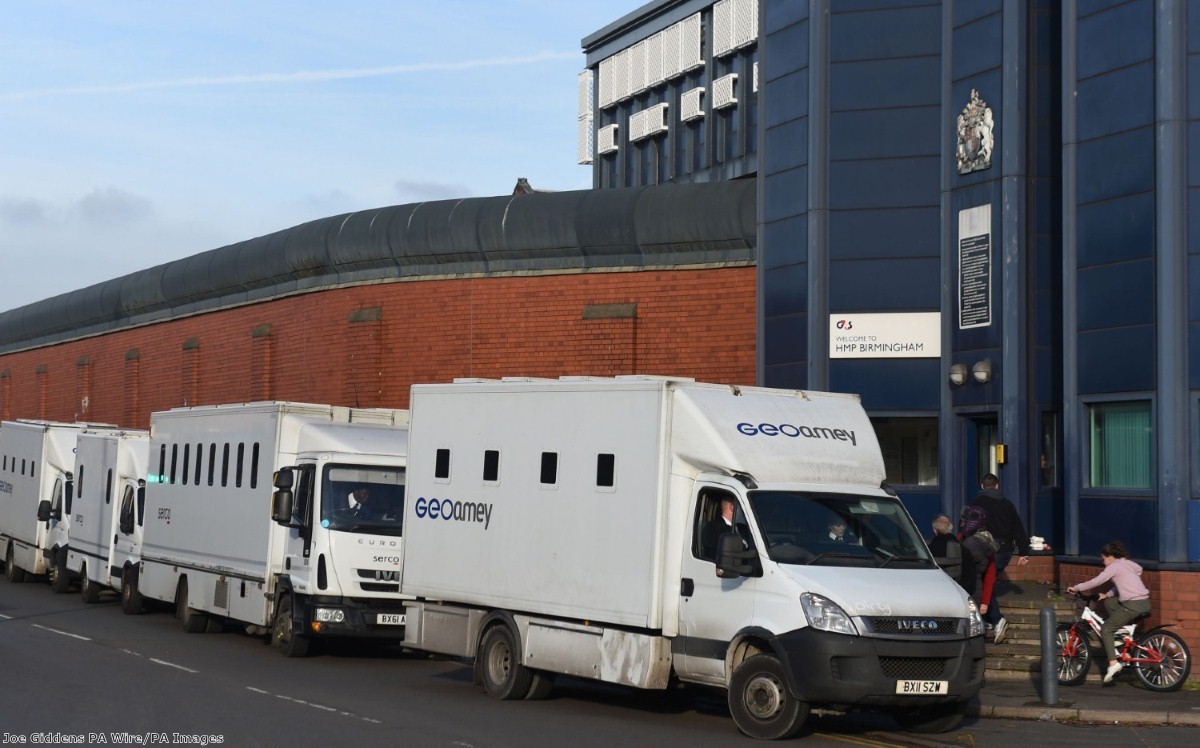 Custody vans wait to move prisoners out of HMP Birmingham after Friday's disturbance