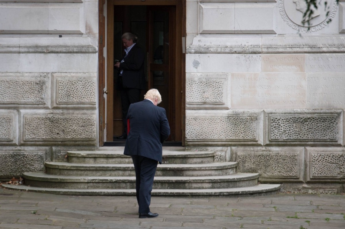 Boris Johnson enters the Foreign Office following a meeting in Downing Street over the summer