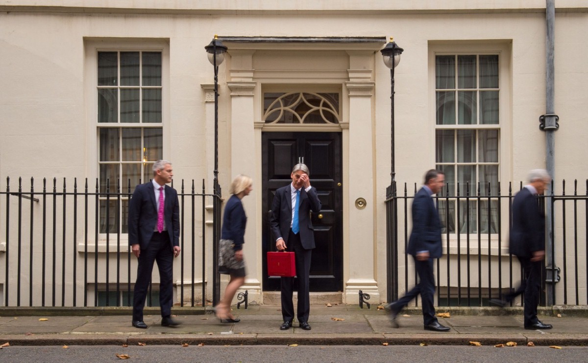 Stephen Barclay, Liz Truss, Mel Stride and Andrew Jones leave Philip Hammond with his red box outside 11 Downing Street this morning.