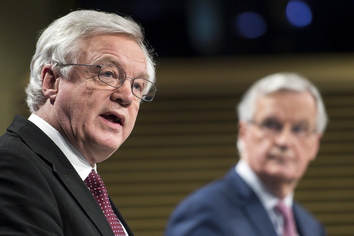 David Davis addresses journalists as Michel Barnier looks on during their press conference today.