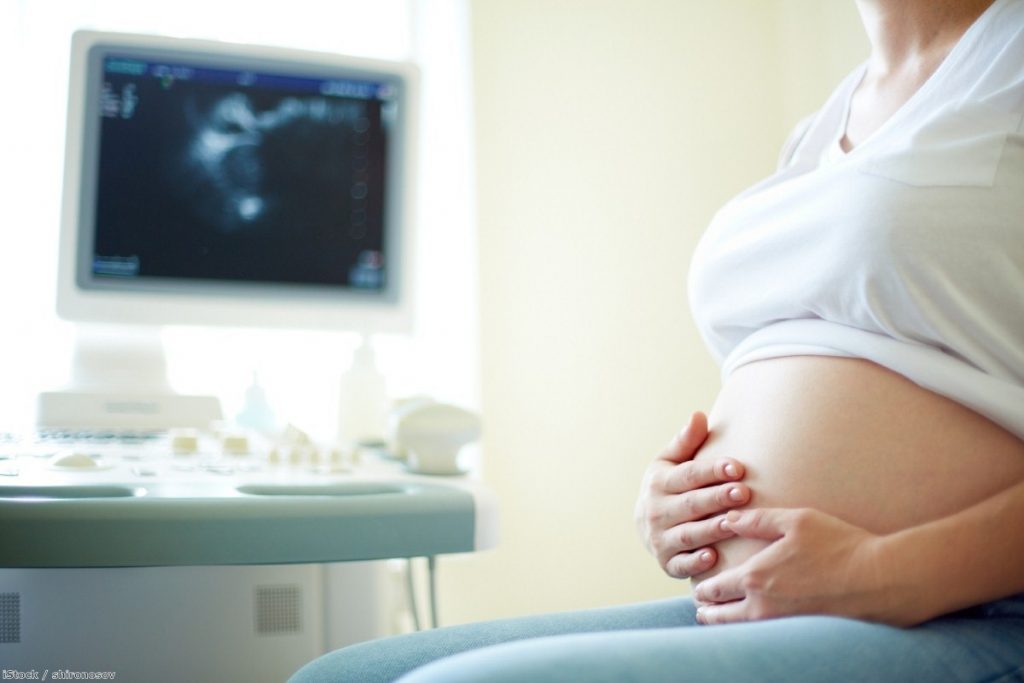 NHS charging rules cause pregnant women distress and anxiety, discouraging them from seeking care | Copyright: iStock / shironosov