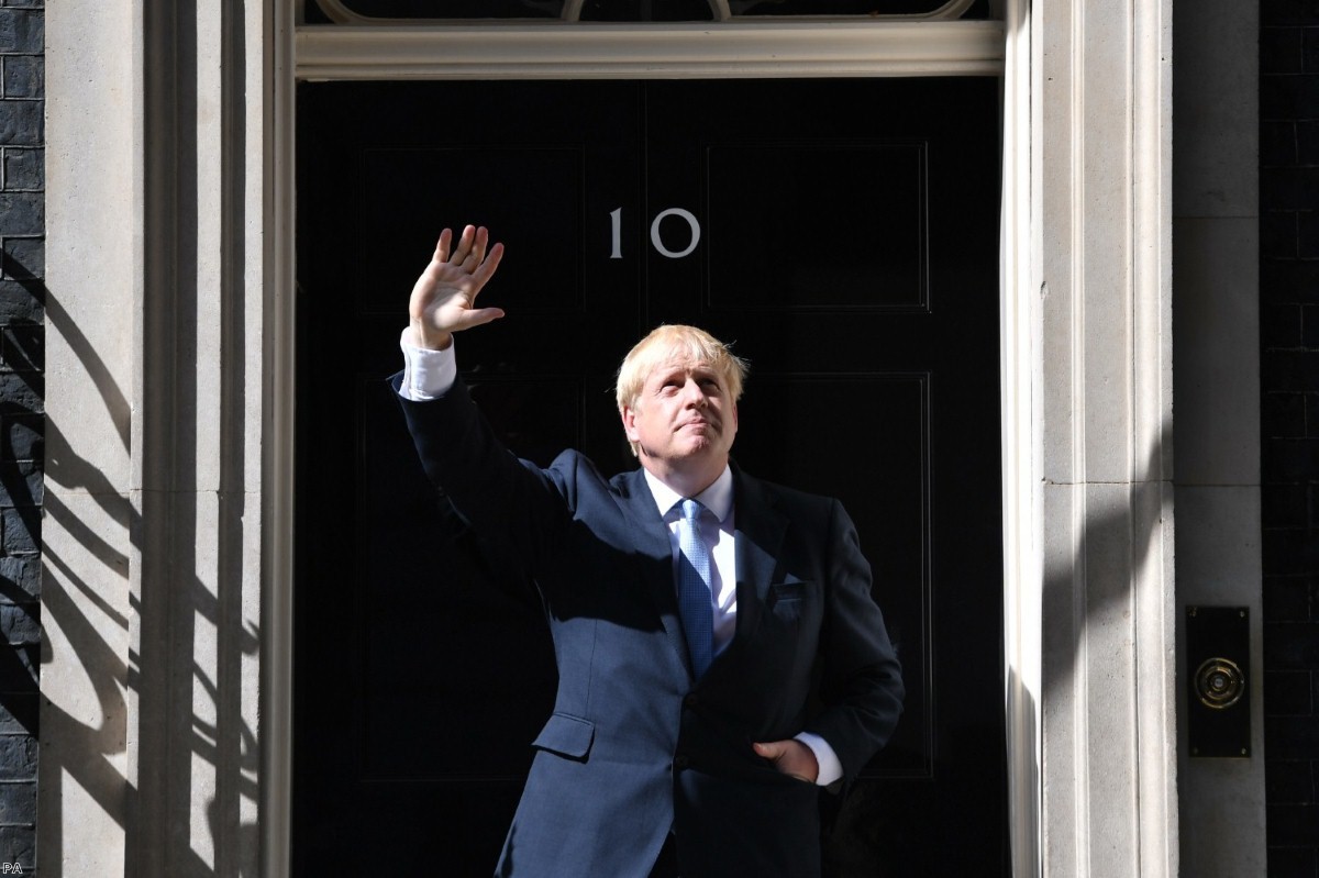 Johnson outside No.10 after he returns from seeing the Queen