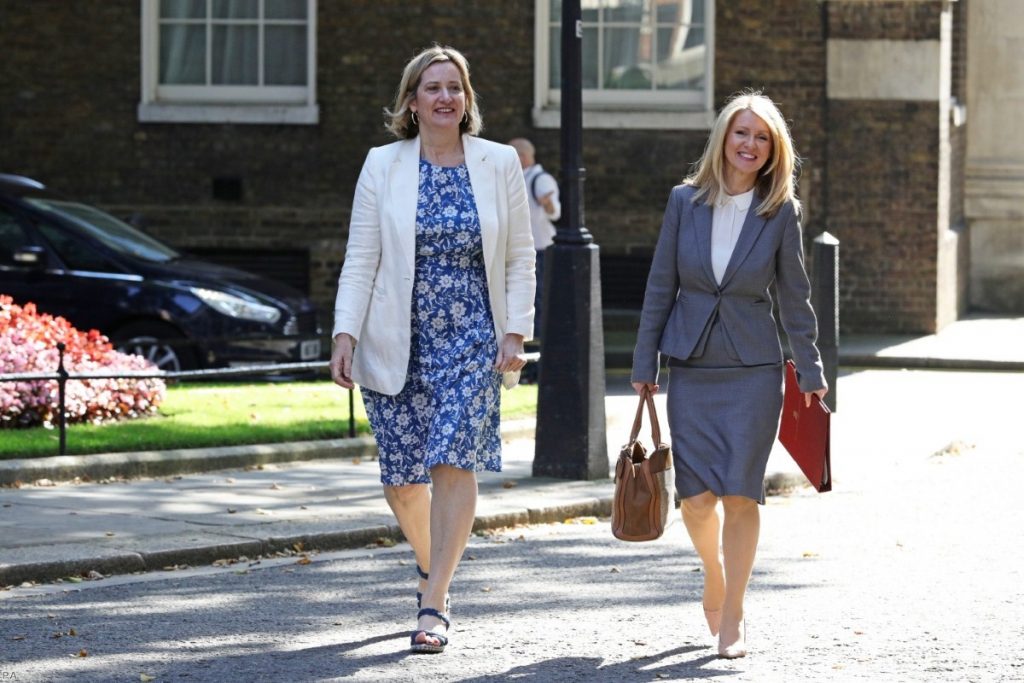 Amber Rudd leaves Boris Johnson's first Cabinet meeting beside Esther McVey.