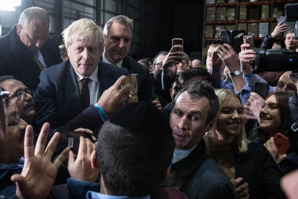 Boris Johnson during a visit to Globus Group in Stretford, Manchester, while on the campaign trail