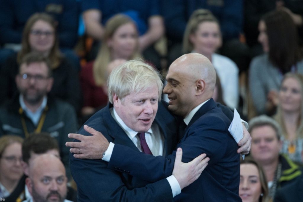 Javid and Johnson embrace during the election last year. This morning, the chancellor resigned.