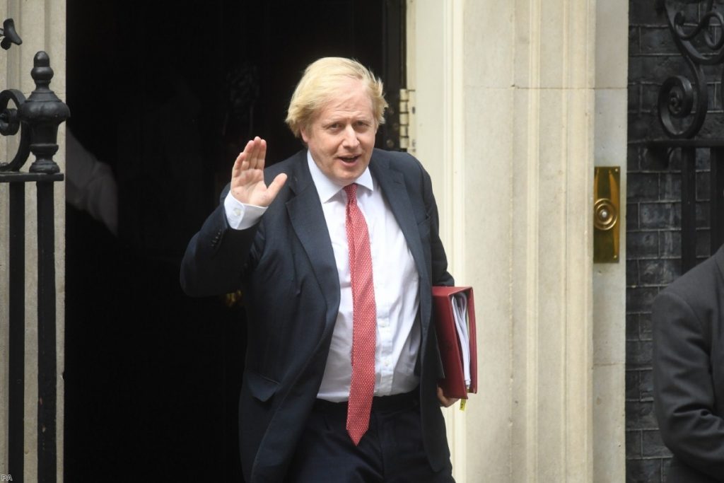 Boris Johnson leaves 10 Downing Street for the House of Commons ahead of his statement this afternoon