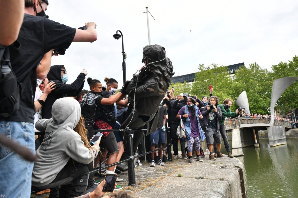 Protesters throw a statue of Edward Colston into Bristol harbour during a Black Lives Matter protest last weekend.