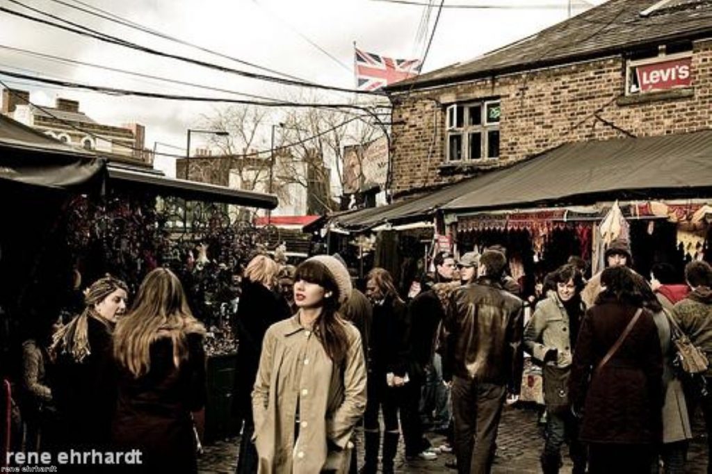 Shoppers in Camden market. Critics say the government's economic agenda will not stimulate growth.