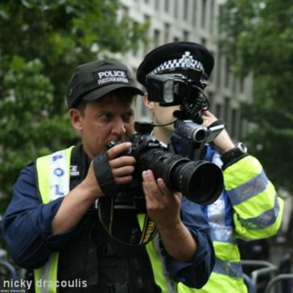 Police surveillance teams are a common feature at recent protests