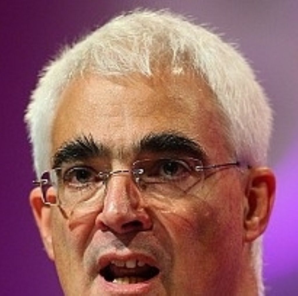 Alistair Darling defended government's massive borrowing commitment
