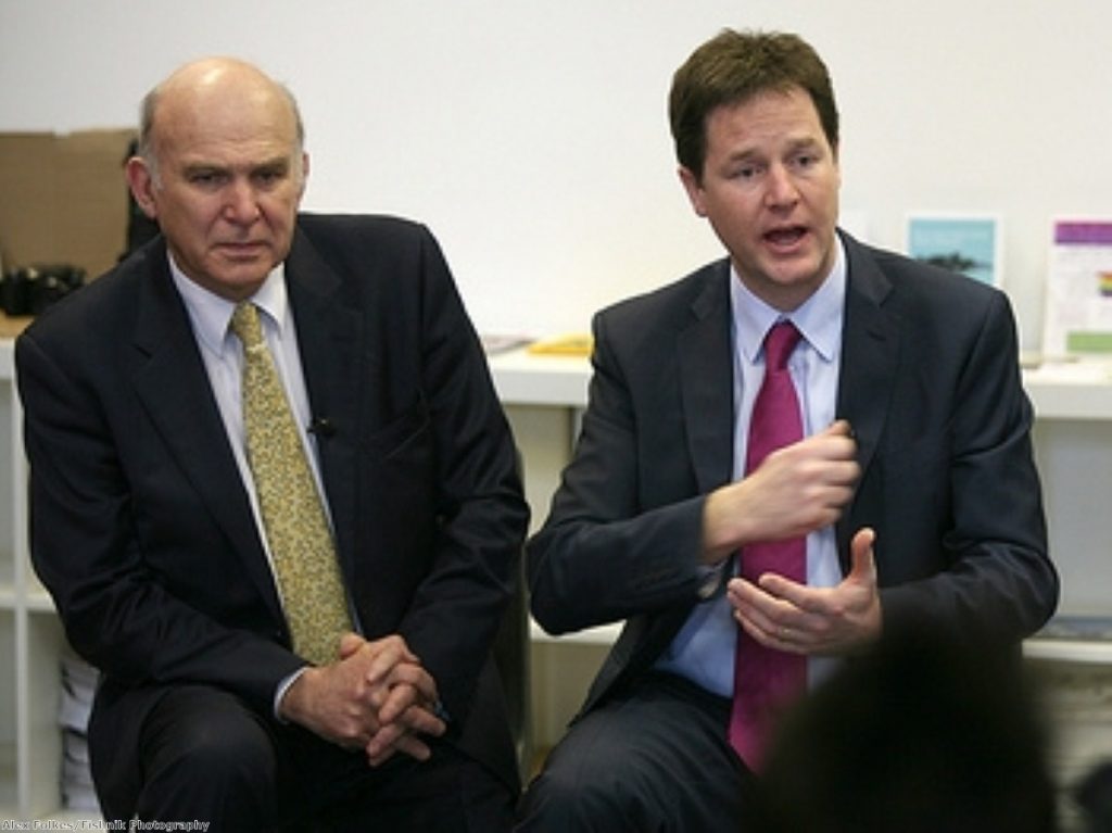 Cable (left) has made clear he is not entirely comfortable in Cameron and Clegg's coalition government