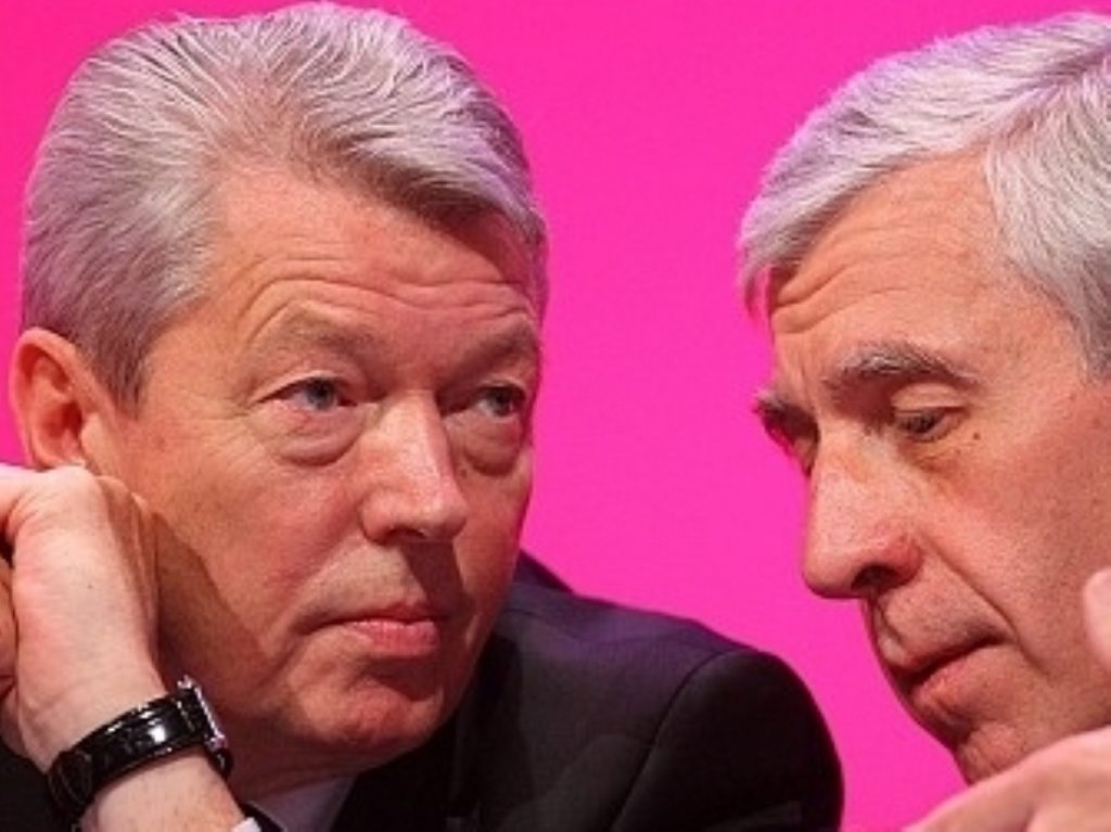 Alan Johnson talks with Jack Straw.Both men defended Labour's civil liberties record today.